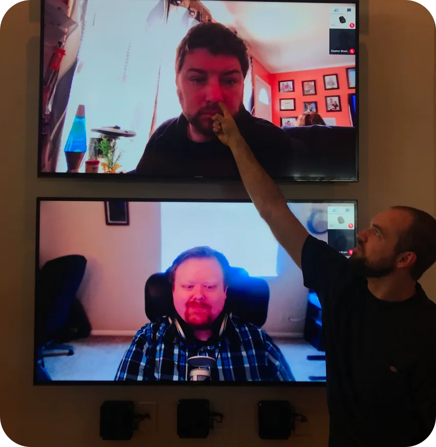 Team member virtually picking colleague's nose